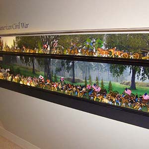Custom wall-mounted cases outfitted with LEDs at the Frazier History Museum