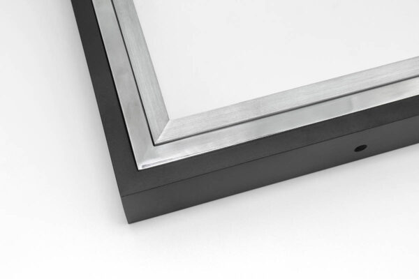 Close up image of SmallCorp TIG4 welded aluminum frame corner sample in black, polished, and brushed