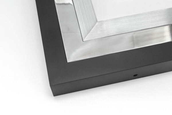 Close up image of SmallCorp TIG7 welded aluminum frame corner sample in black, polished, and brushed