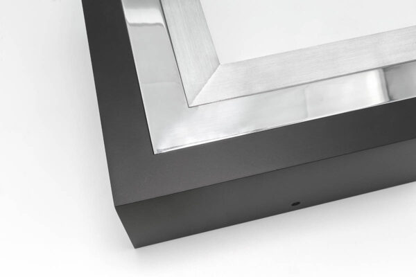 Close up image of SmallCorp TIG8 welded aluminum frame corner sample in black, polished, and brushed
