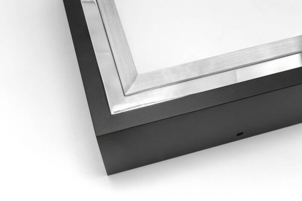 Close up image of SmallCorp TIG9 welded aluminum frame corner sample in black, polished, and brushed